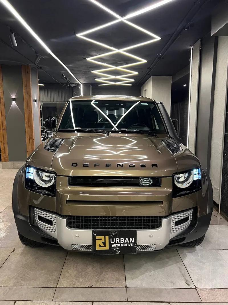 Land Rover defender gold