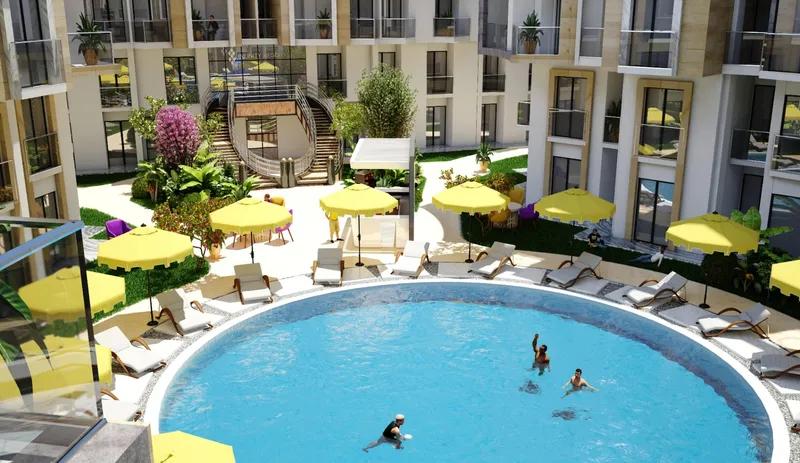 شقة 85م² أوضتين وصالة بإطلالة جانبية على البحر أكوا إنفينيتي