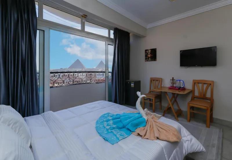 فندق صن رايز ( في قلب اهرامات الجيزة )متوفر غرف دبل تربل سنجل